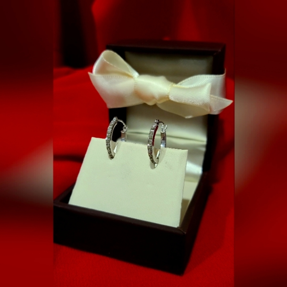 White gold plated huggies with tiny diamonds